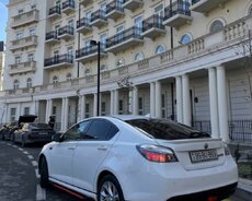 MG 6, 2012 il
